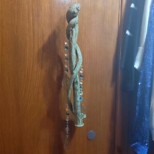 Rustic Twisted Wood Suncatcher With Leaf Accents.